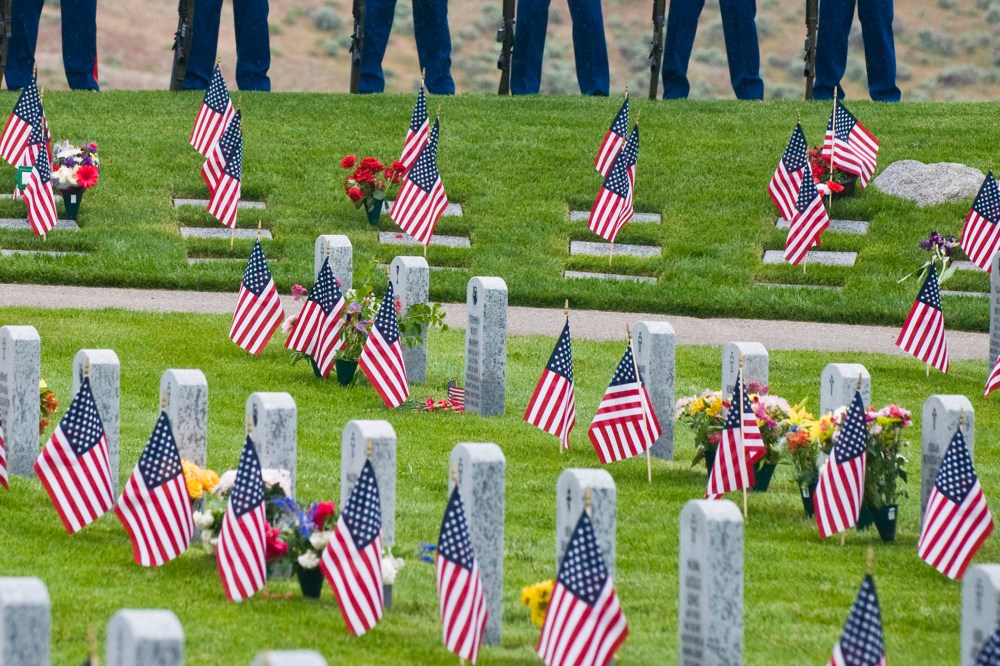 Marines stand at ease on the hillside during a Memorial Day Ceremony on Monday, May 31, 2010 at the Idaho Veterans Cemetery in Boise, Idaho.