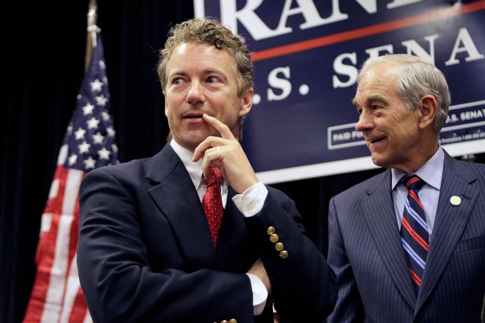 Rand Paul appears with his father U.S. Rep. Ron Paul during a campaign event in Erlanger, Ky. on Oct. 2, 2010. (Photo by Ed Reinke/AP)