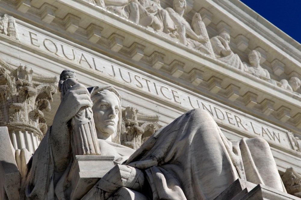 File Photo: The west facade of the U.S. Supreme Court. (Photo by: J. Scott Applewhite/AP Photo)