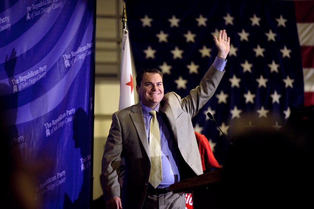 Carl DeMaio walks on stage during an event in La Jolla, Calif. on Sept. 7, 2011.