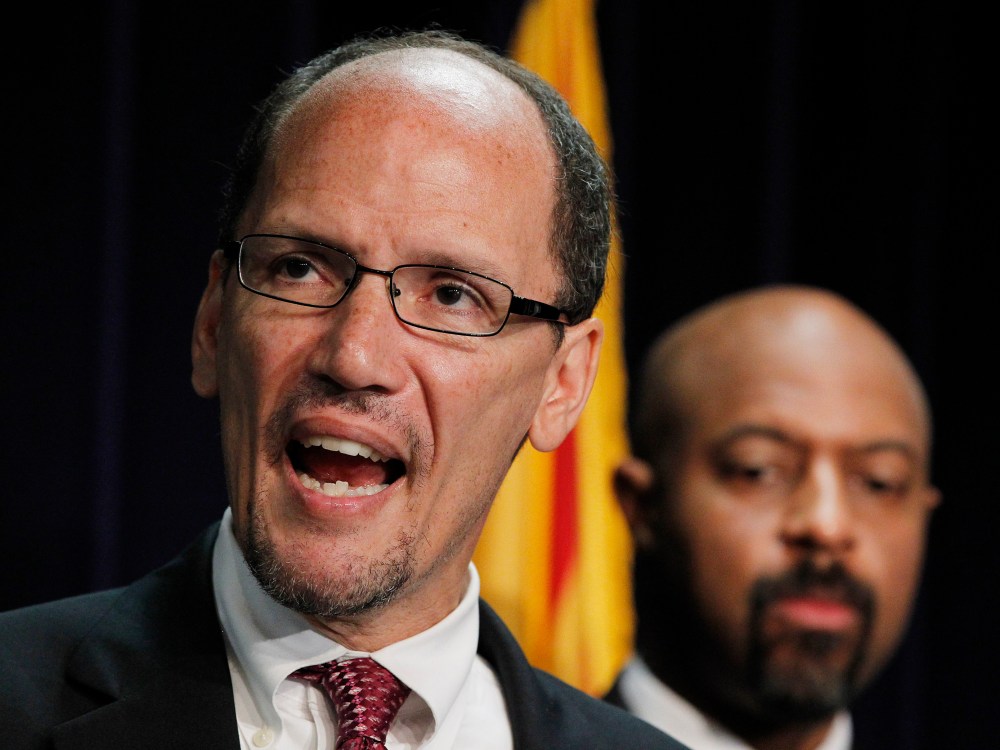 File Photo: Thursday, May 10, 2012 file photo, United States Assistant Attorney General Thomas Perez, left, who heads up the civil rights division at the Department of Justice, is joined by Deputy Assistant Attorney General for Civil Rights, Roy Austin...