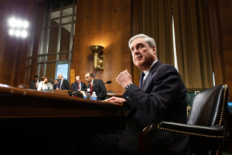 Then FBI Director Robert Mueller arrives on Capitol Hill in Washington, D.C., May 16, 2012, to testify during a hearing.