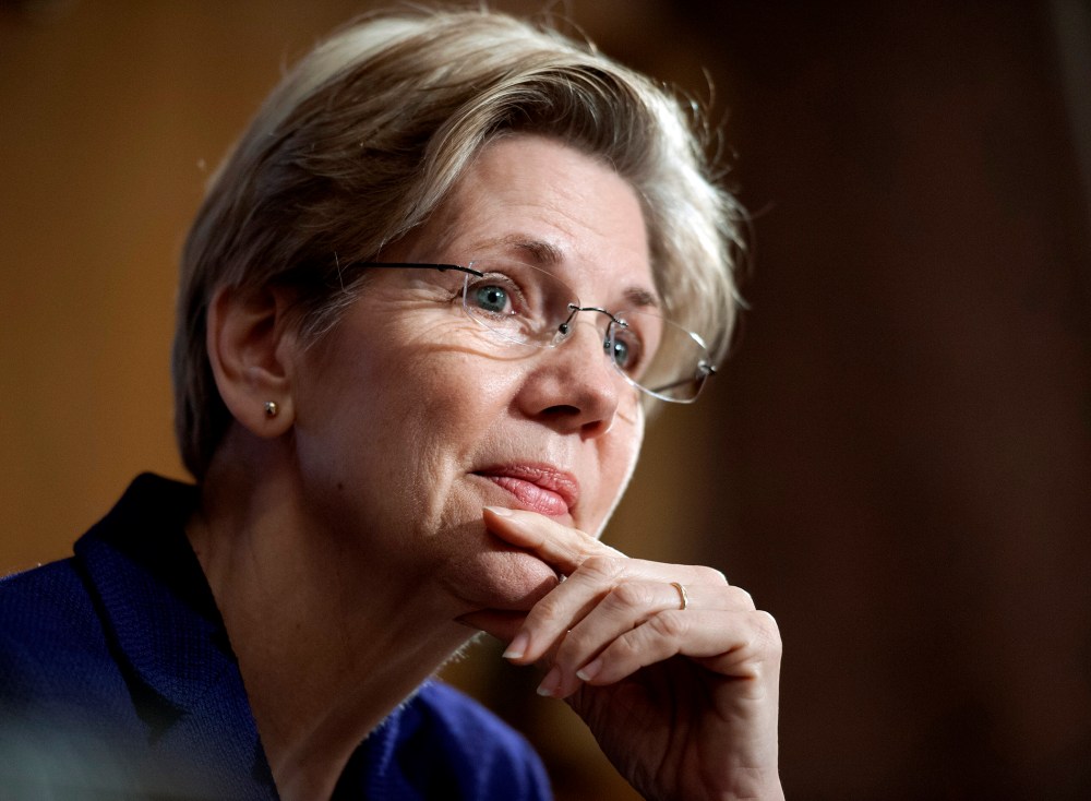 Sen. Elizabeth Warren, D-Mass., listens to a witness at Senate Banking Committee hearing on anti-money laundering on Capitol Hill in Washington on March 7, 2013. (Photo by Cliff Owen/AP)
