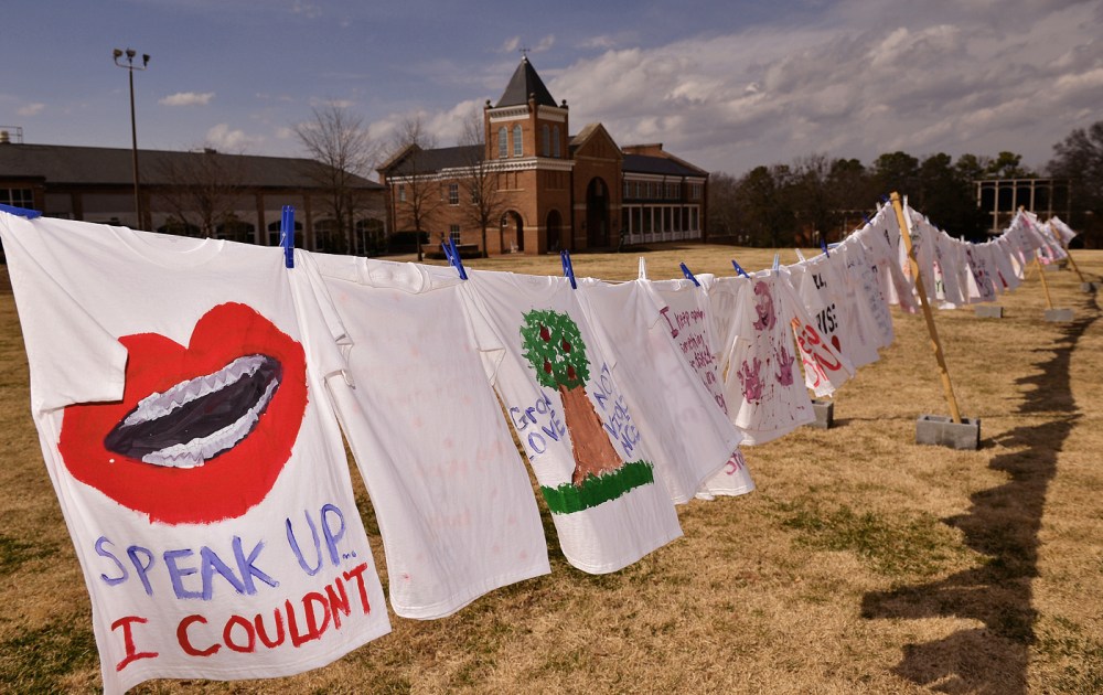 T-shirts display messages on the Clothesline Project at Converse College in Spartanburg, S.C, on Feb. 20, 2014.