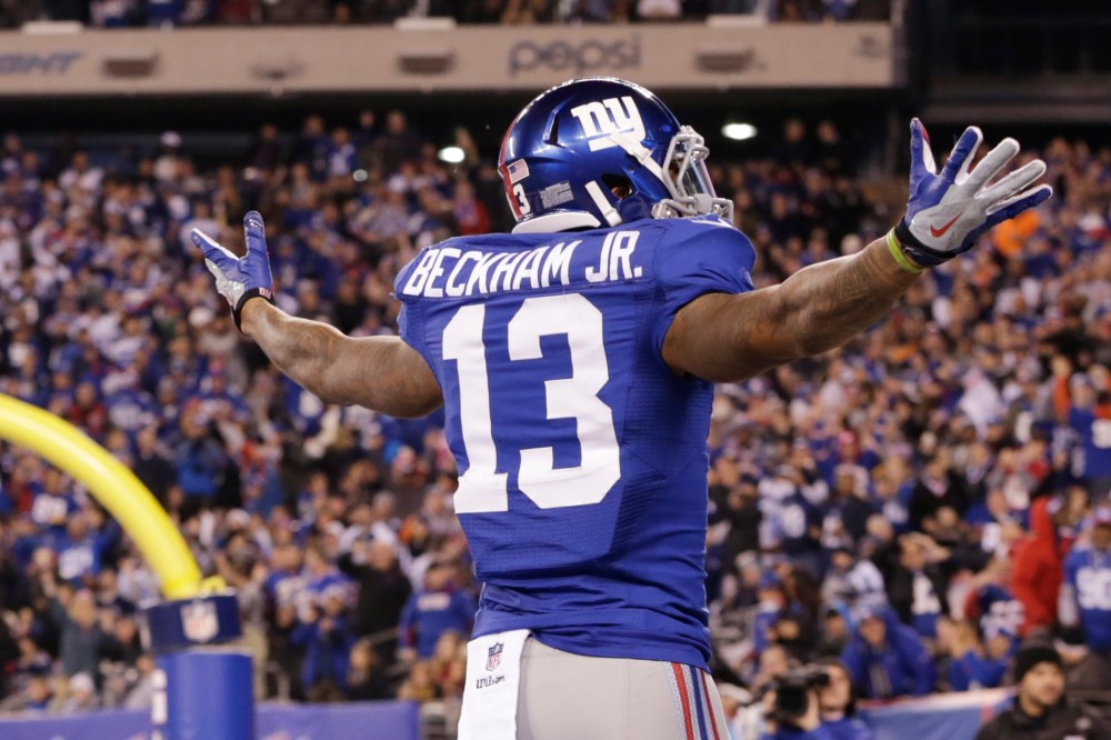 New York Giants wide receiver Odell Beckham Jr. reacts after making a one-handed catch for a touchdown against the Dallas Cowboys on Nov. 23, 2014, in East Rutherford, N.J. (Julio Cortez/AP)