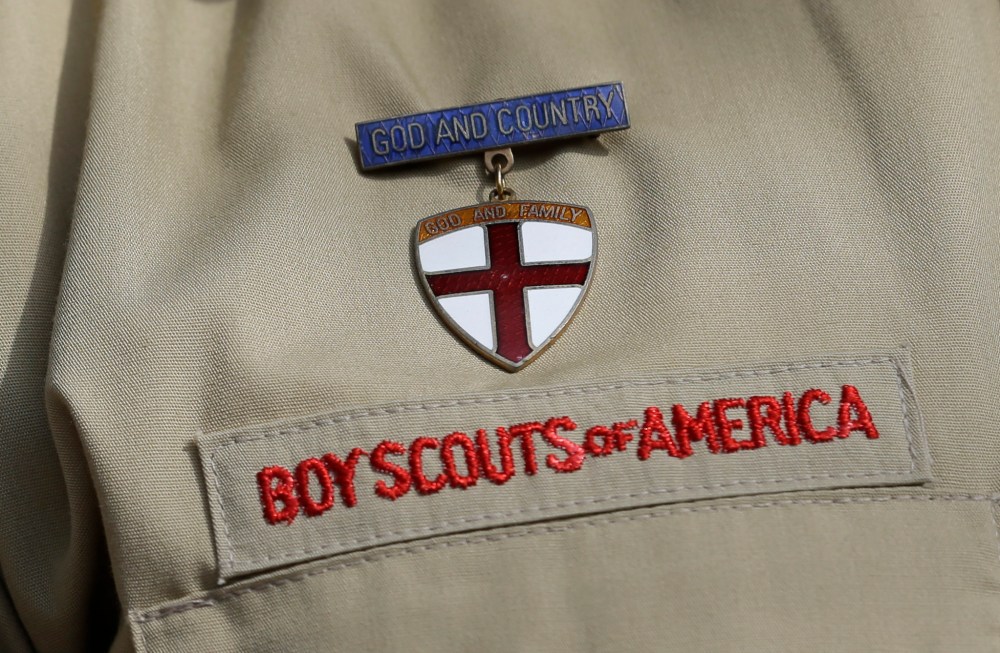 This photo taken Monday, Feb. 4, 2013, shows a close up detail of a Boy Scout uniform in Irving, Texas. (Photo by Tony Gutierrez/AP)