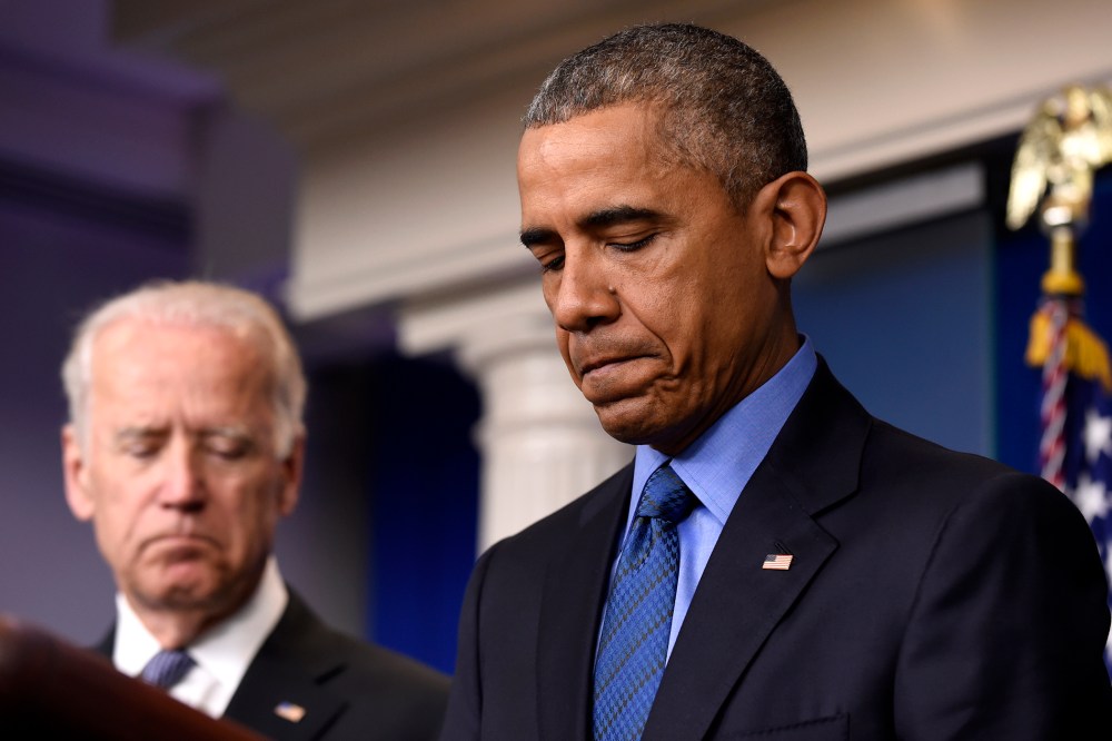 President Barack Obama, accompanied by Vice President Joe Biden, pauses while speaking in the Brady Press Briefing Room of the White House in Washington, D.C., June 18, 2015, on the church shooting in Charleston, S.C. (Photo by Susan Walsh/AP)