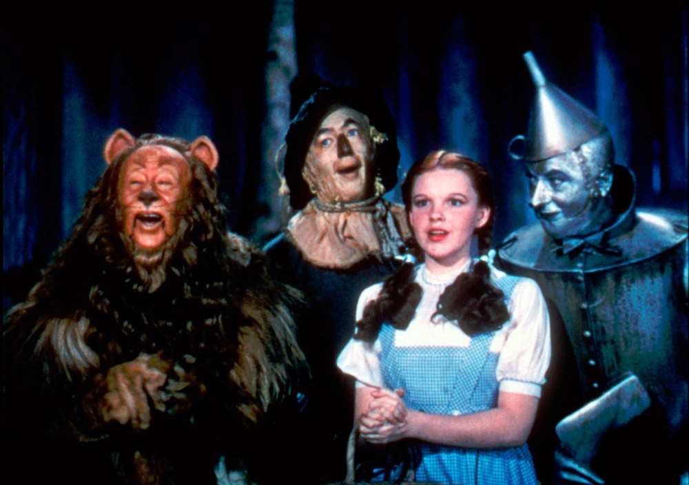 This 1939 file photo provided by Warner Bros. shows, from left, Bert Lahr as the Cowardly Lion, Ray Bolger as the Scarecrow, Judy Garland as Dorothy and Jack Haley as the Tin Woodman in a scene from "The Wizard of Oz."