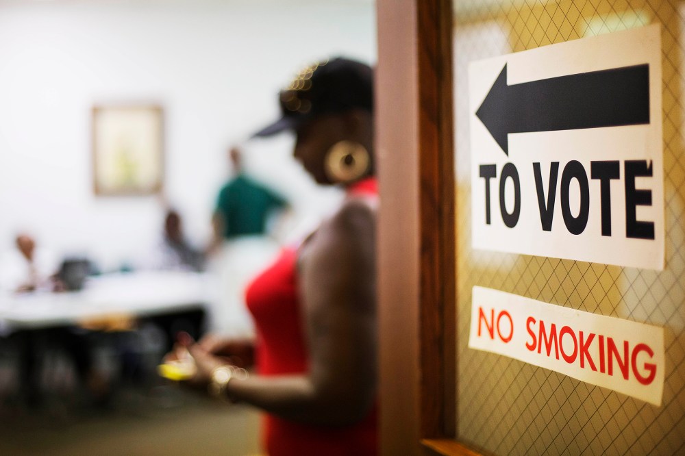 A sign directs voters at a polling site on July 22, 2014, in Atlanta, Ga.