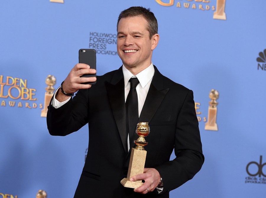 Matt Damon poses with the award for Best Performance by an Actor in a Motion Picture - Musical or Comedy for 