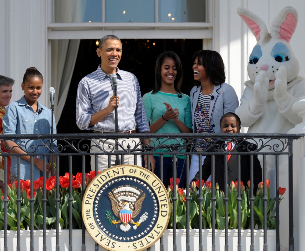 President Obama, accompanied by Michelle Obama, daughters Sasha and Malia, the Easter Bunny and Robby Novak, the Kid President, speak to the crowd during the annual Easter Egg Roll. (AP Photo/Susan Walsh)