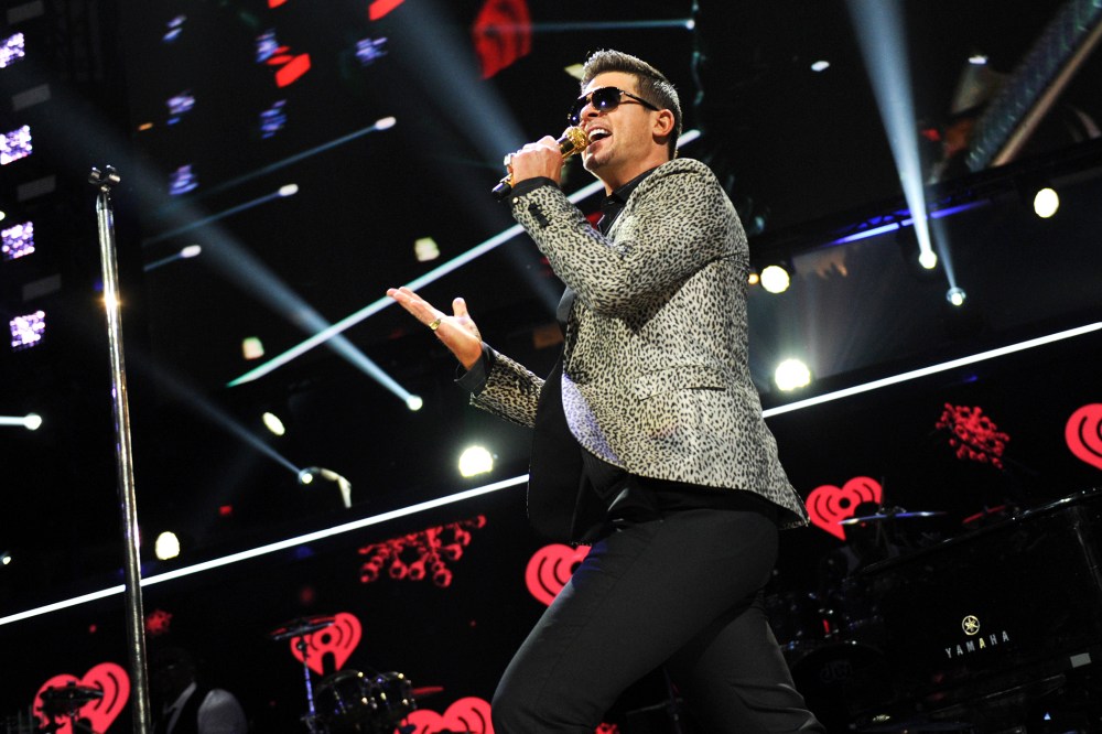 This Dec. 13, 2013 file photo shows Robin Thicke performing at Madison Square Garden in New York, N.Y. (Photo by Evan Agostini/Invision/AP)