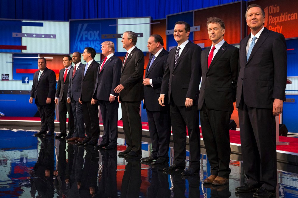 Republican presidential candidates take the stage for the first Republican presidential debate at the Quicken Loans Arena, Aug. 6, 2015, in Cleveland. (Photo by John Minchillo/AP)