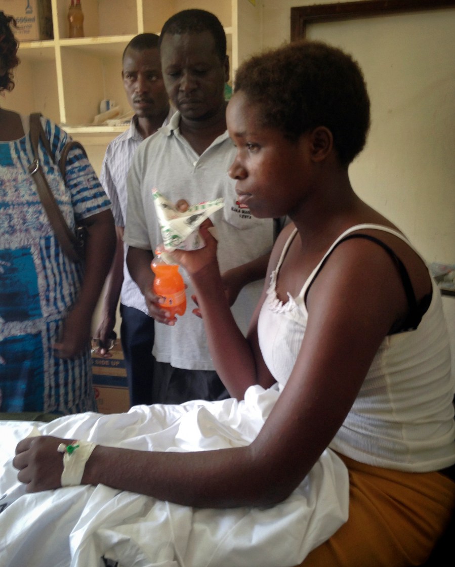 Survivor of the killings at Garissa University College Cynthia Cheroitich, 19, who was found on Saturday two days after the attack, drinks some milk in a hospital ward in Garissa, Kenya, April 4, 2015. (Photo by Christopher Torchia/AP)