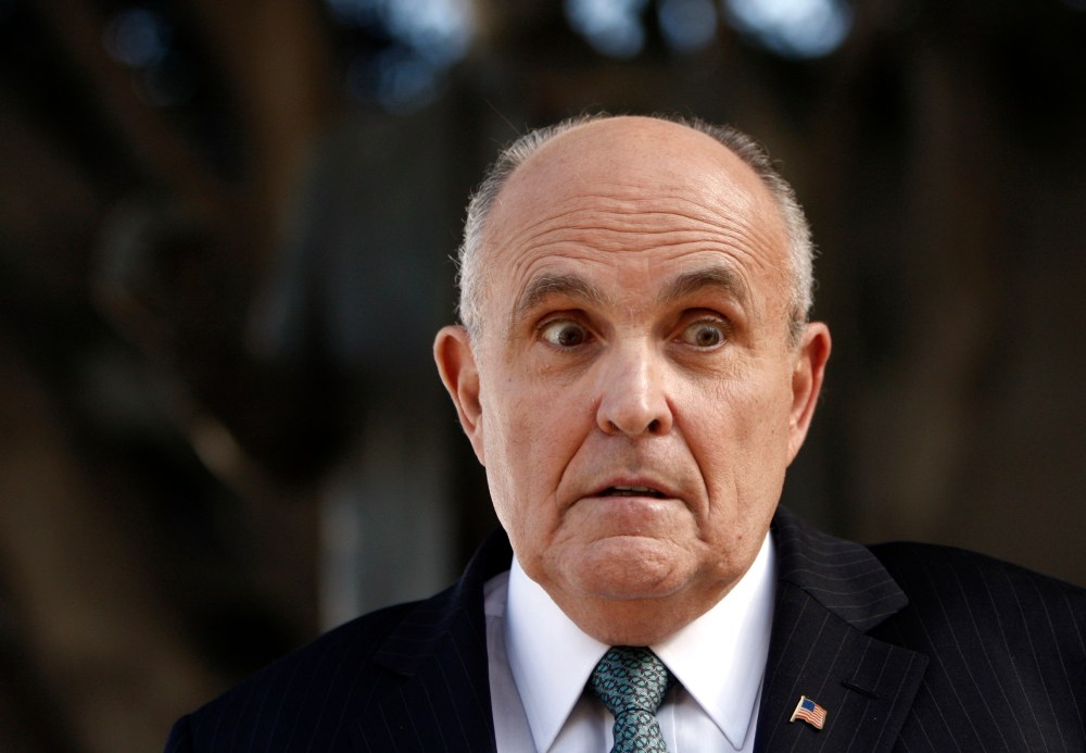 Lawyer and former New York City Mayor Rudy Giuliani at a press conference after appearing in court to call for the dismissal of a lawsuit filed against video game giant Activision in Los Angeles, Calif., Oct. 16, 2014. (Photo by Damian Dovarganes/AP)