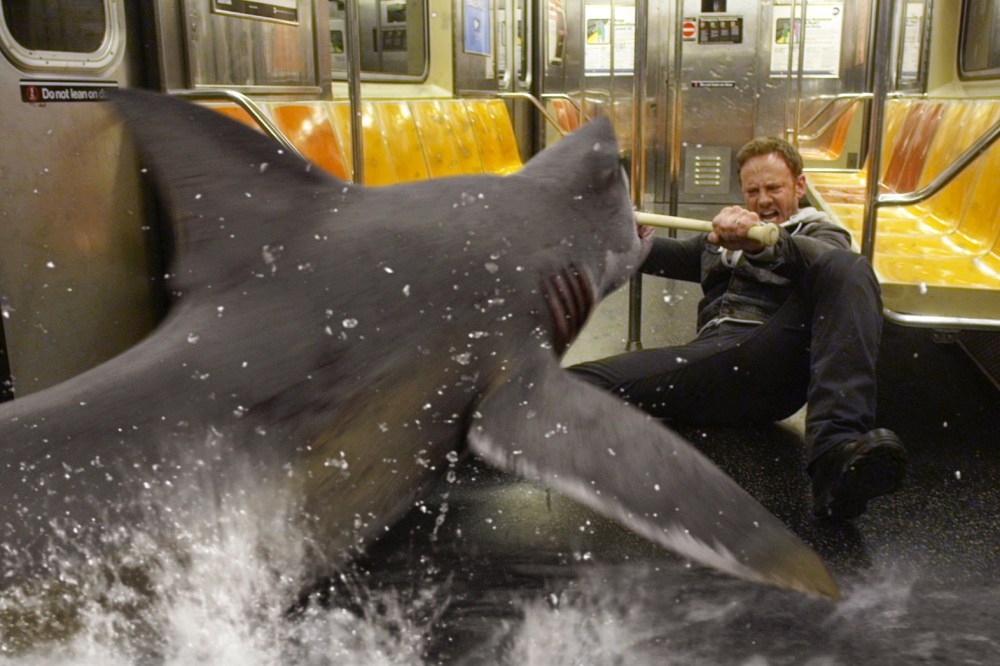 In this image released by Syfy, Ian Ziering, as Fin Shepard battles a shark on a New York City subway in a scene from "Sharknado 2: The Second One.