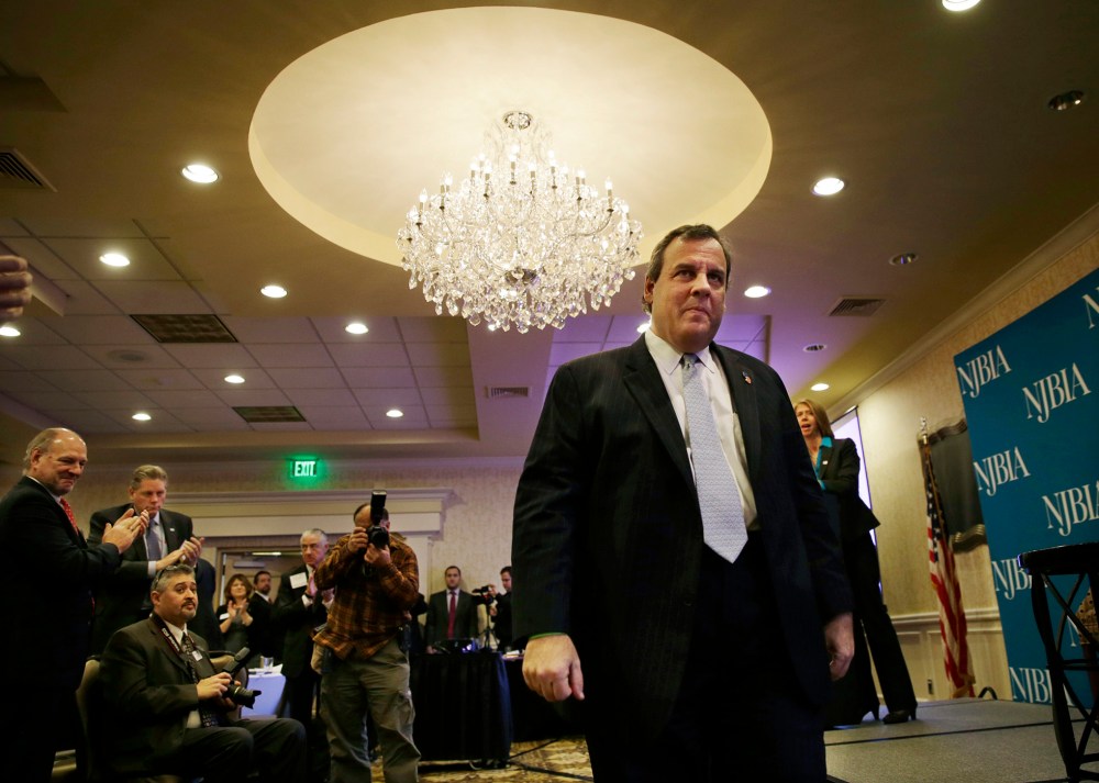 People applaud New Jersey Gov. Chris Christie after he addressed a gathering of New Jersey business leaders, Dec. 8, 2015, in East Windsor, N.J. (Photo by Mel Evans/AP)