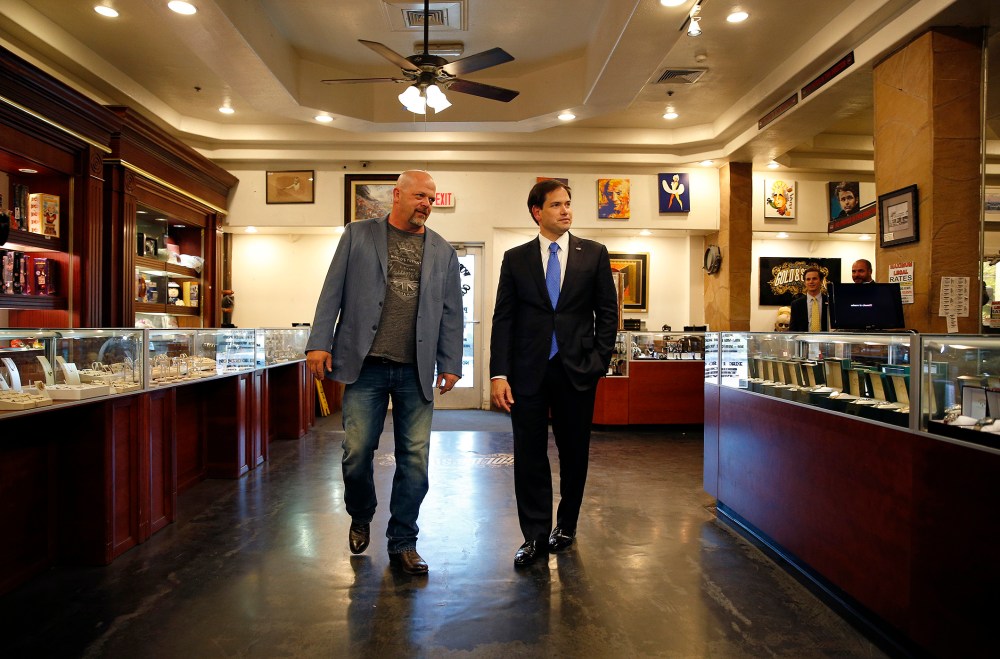 Republican presidential candidate Sen. Marco Rubio, R-Fla., tours the World Famous Gold & Silver Pawn shop with owner Rick Harrison, May 28, 2015, in Las Vegas. (Photo by John Locher/AP)