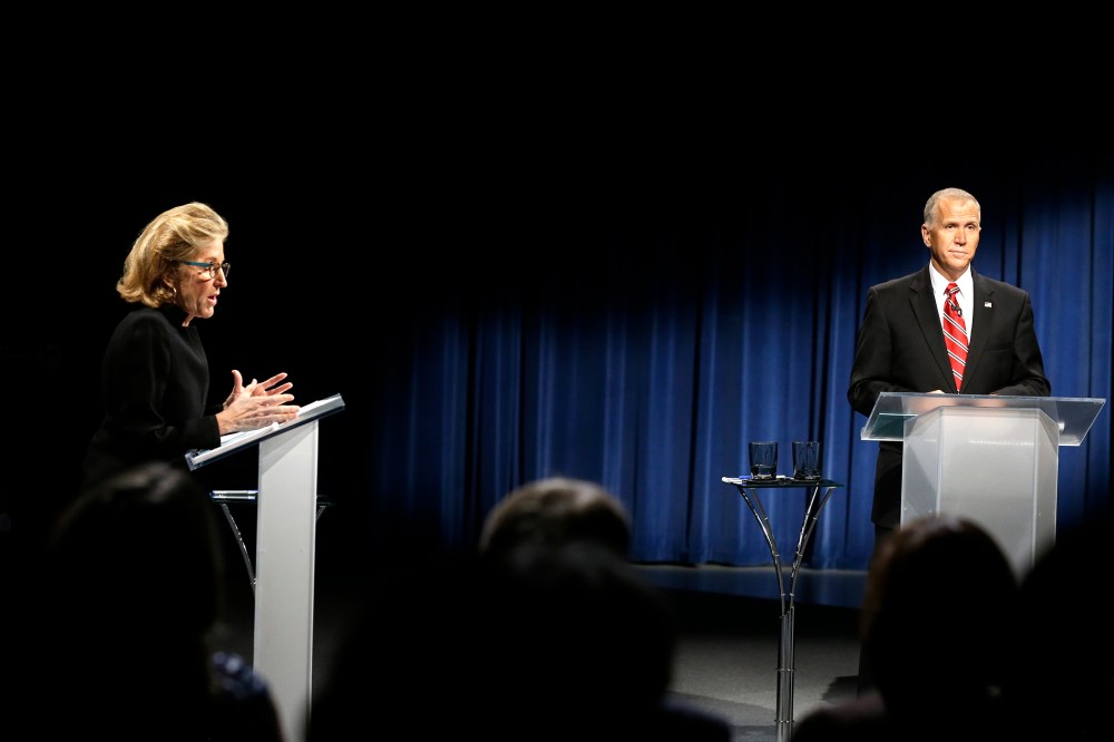 Sen. Kay Hagan, D-N.C., left, and North Carolina Republican Senate candidate Thom Tillis participate in a live televised debate at UNC-TV studios in Research Triangle Park , N.C., Oct. 7, 2014. (Photo by Gerry Broome/Pool/AP)