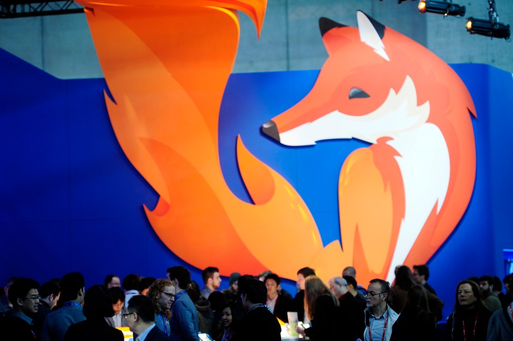 People gather in the Firefox booth at the Mobile World Congress, the world's largest mobile phone trade show in Barcelona, Spain, Feb. 27, 2014.