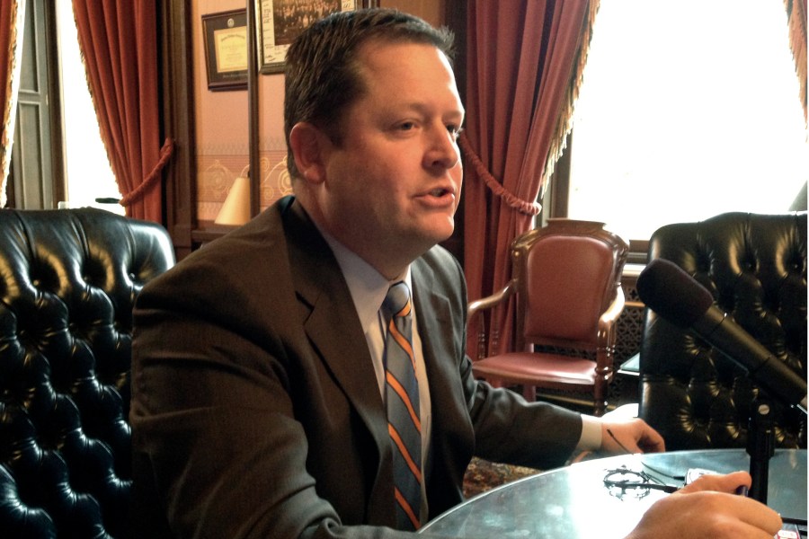 Michigan House Speaker Jase Bolger talks with reporters in his Capitol office on Nov. 12, 2014 about the Michigan Religious Freedom Restoration Act. (David Eggert/AP)