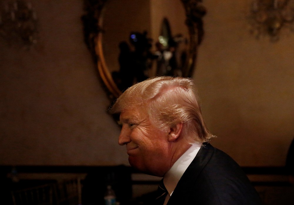 Republican presidential candidate Donald Trump walks away from the stage after he speaks during a press conference, March 5, 2016, in West Palm Beach, Fla. (Photo by Brynn Anderson/AP)