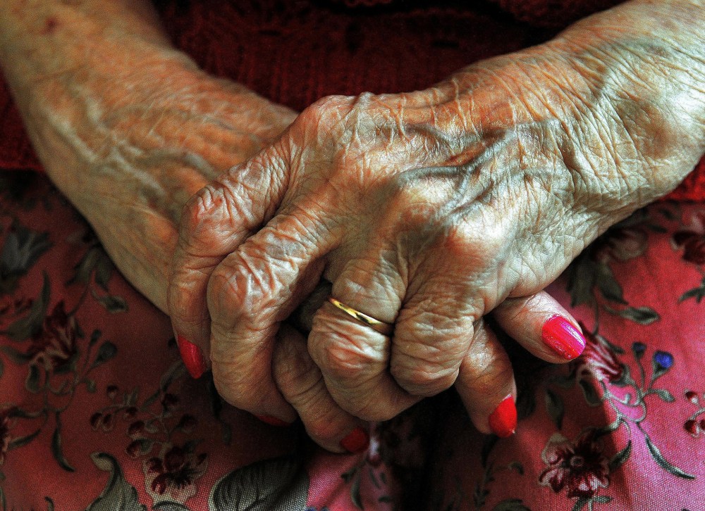 The hands of an elderly woman. (Photo by John Stillwell/PA Wire/AP)