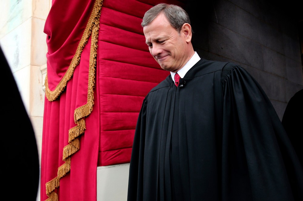 U.S. Supreme Court Chief Justice John Roberts arriving at the West Front of the U.S. Capitol in Washington, where Roberts administered the oath of office to President Barack Obama, Jan. 21, 2015. (Photo by Win McNamee/AP)
