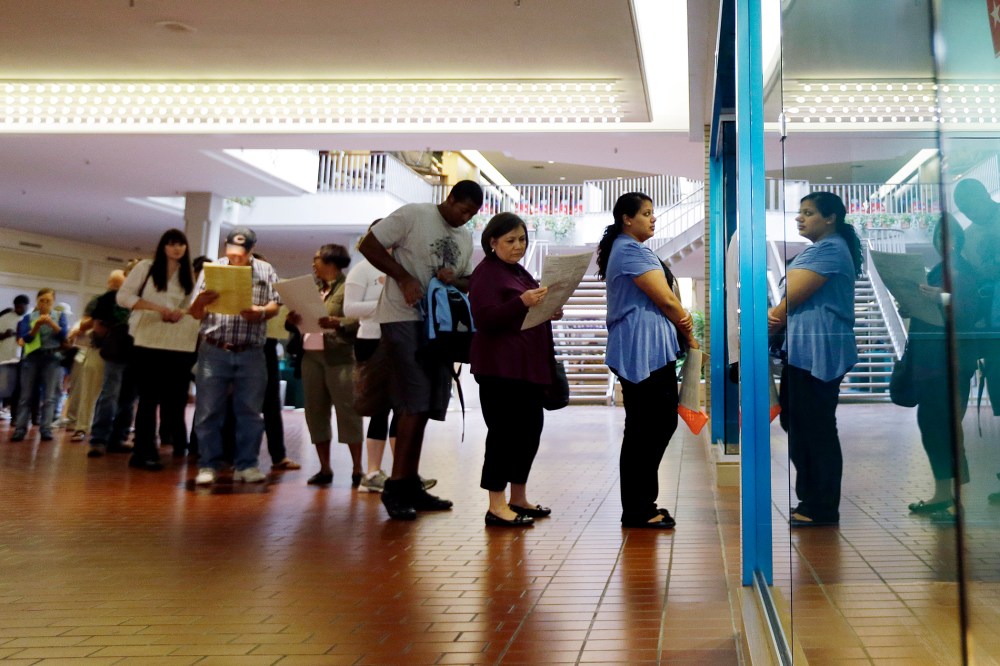 Voters wait in line at a polling place located inside a shopping mall, on Election Day on Nov. 6, 2012, in Austin, Texas. (Eric Gay/AP)