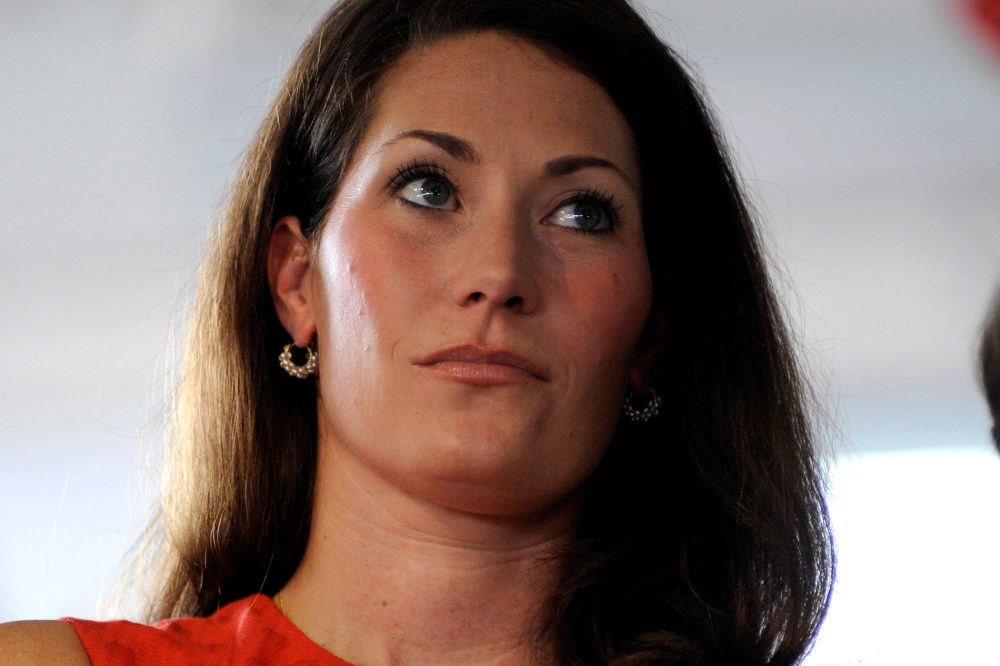 Kentucky Secretary of State Alison Lundergan Grimes, candidate for U.S. Senate, waits to speak during the 133rd Annual Fancy Farm Picnic in Fancy Farm, Ky., Aug. 3, 2013.