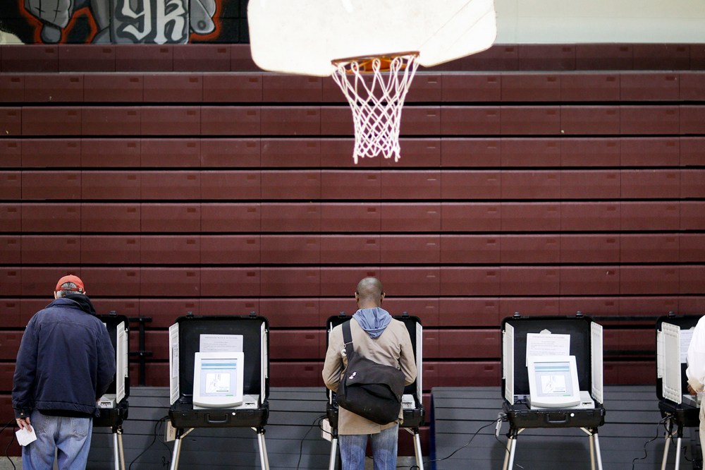 Voters cast their ballots at a polling site for Georgia's primary election, May 20, 2014, in Atlanta, Ga.