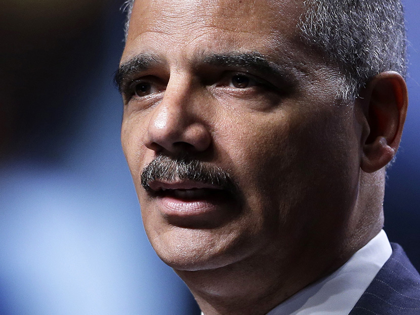 In this July 25, 2013 file photo, Attorney General Eric Holder speaks in Philadelphia. Holder tells Russia US won't seek death penalty for Edward Snowden. (Photo by Matt Rourke/AP)