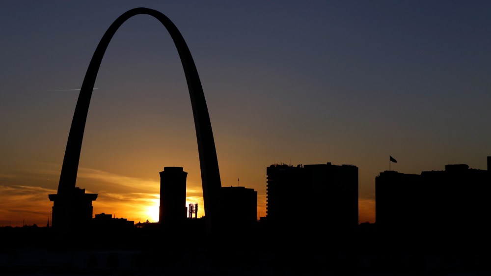 In this Jan. 7, 2014 file photo the Gateway Arch dominates the skyline in St. Louis. (Photo by Jeff Roberson/AP)