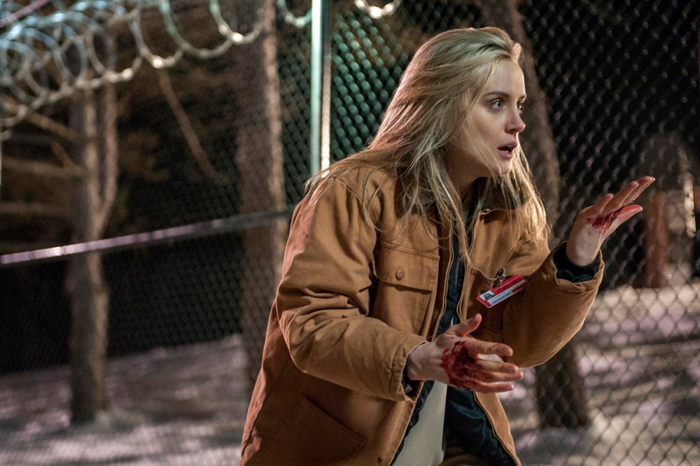 This image released by Netflix shows Taylor Schilling in a scene from "Orange is the New Black."