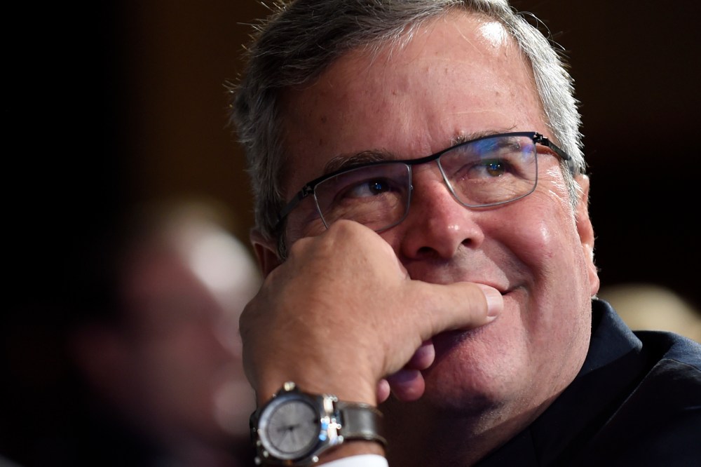 Former Florida Gov. Jeb Bush listens to a speaker before giving his keynote address at the National Summit on Education Reform in Washington on Nov. 20, 2014. (Susan Walsh/AP)