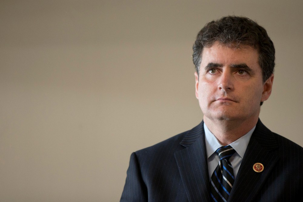 Rep. Mike Fitzpatrick, R-Pa., listens during a news conference Feb. 10, 2014, at a Fraternal Order of Police lodge in Philadelphia.  Photo by Matt Rourke/AP