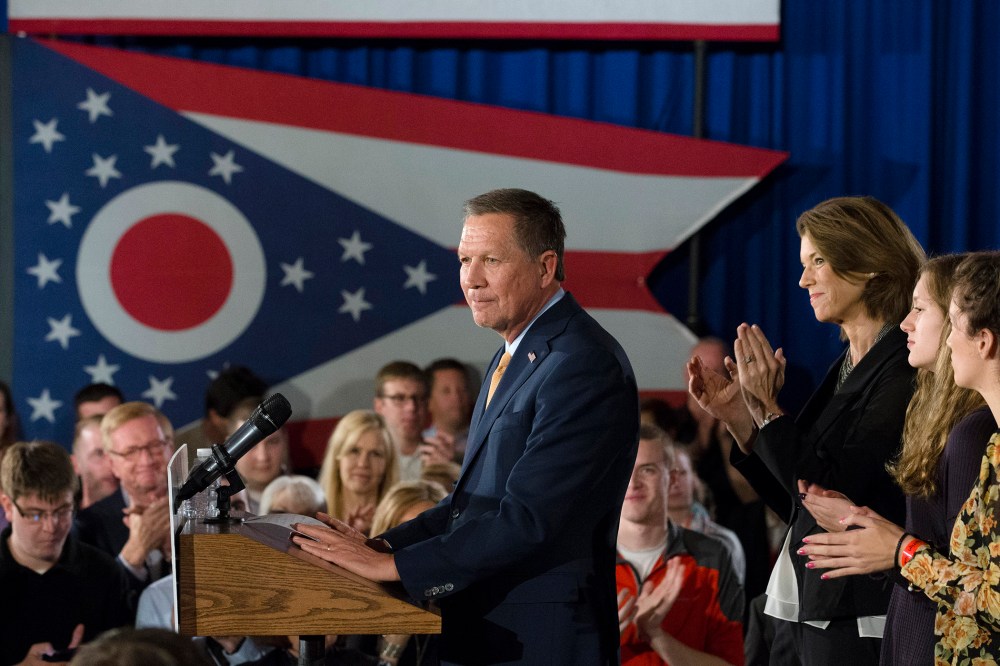 Republican presidential candidate Ohio Gov. John Kasich smiles as he is applauded during a watch party at the Renaissance Columbus Downtown Hotel, March 8, 2016, in Columbus, Ohio. (Photo by John Minchillo/AP)