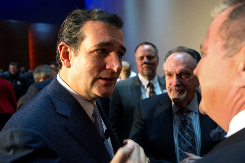 U.S. Sen. Ted Cruz (R-Texas) talks to supporters Friday, Oct. 25, 2013, after speaking at the Republican Party of Iowa's Reagan Dinner at the Iowa Events Center in Des Moines, Iowa.