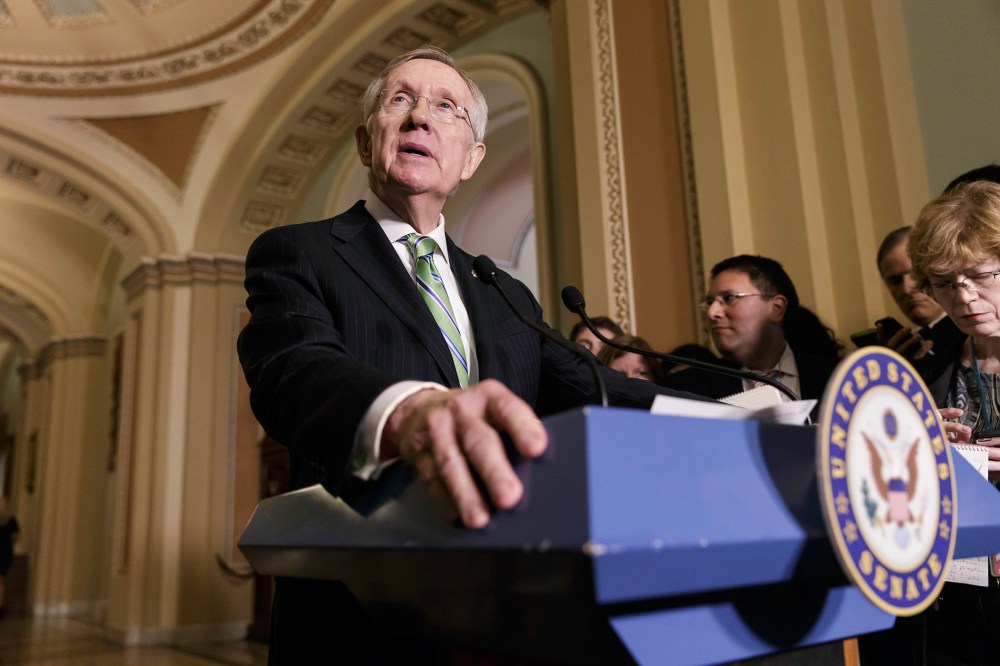 Senate Majority Leader Harry Reid of Nev. speaks to reporters on Capitol Hill in Washington, June 24, 2014.