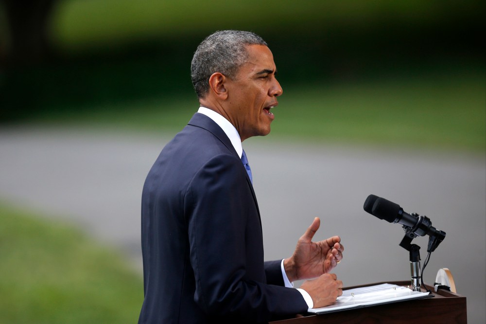 President Barack Obama talks about his administration's response to a growing insurgency foothold in Iraq, Friday, June 13, 2014, on the South Lawn of the White House in Washington, prior to boarding the Marine One Helicopter for Andrews Air Force Base, M