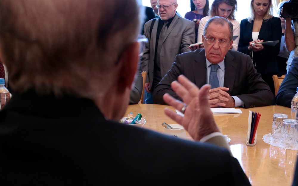 Russian Foreign Minister Sergey Lavrov listens to Qadri Jamil, former deputy prime minister representing Syria's opposition Popular Front of Change and Liberation during a meeting in Moscow, Russia, Aug. 31, 2015. (Photo by Ivan Sekretarev/AP)