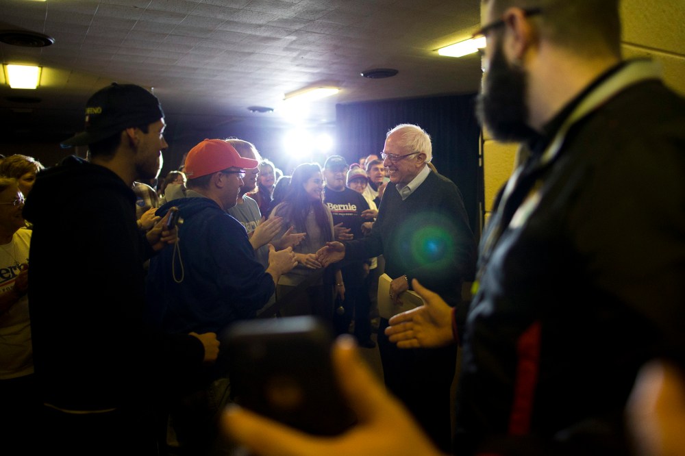 Democratic presidential candidate Sen. Bernie Sanders, I-Vt., shakes hands with supporters as he arrives at a campaign event, Jan. 23, 2016, in Clinton, Ia. (Photo by Jae C. Hong/AP)