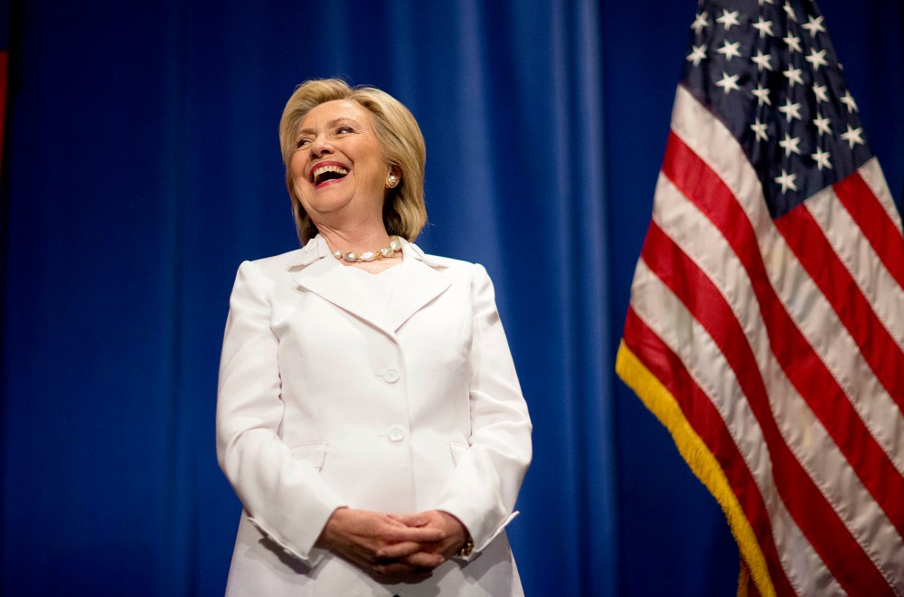 Democratic presidential candidate Hillary Rodham Clinton steps onstage to address an audience at Trident Technical College during a campaign stop, June 17, 2015, in North Charleston, S.C. (Photo by David Goldman/AP)
