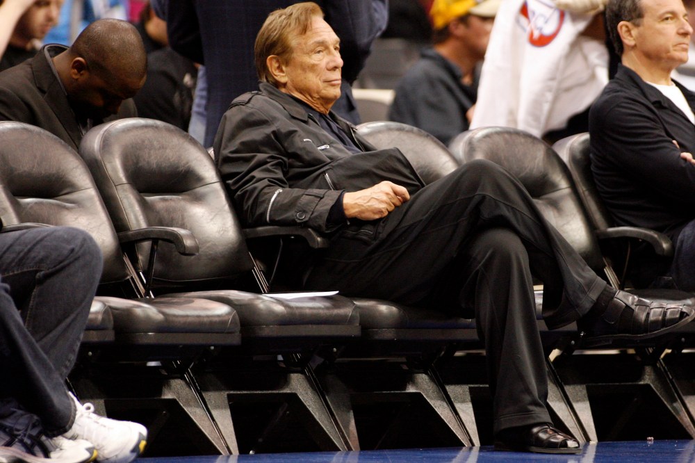 In this April 4, 2010, file photo, Los Angeles Clippers owner Donald Sterling sits court side during the NBA basketball game between the New York Knicks and the Los Angeles Clippers.