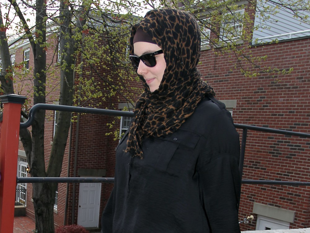 Katherine Russell, right, wife of Boston Marathon bomber suspect Tamerlan Tsarnaev, leaves the law office of DeLuca and Weizenbaum Monday, April 29, 2013, in Providence, R.I. (Photo by Stew Milne/AP Photo)