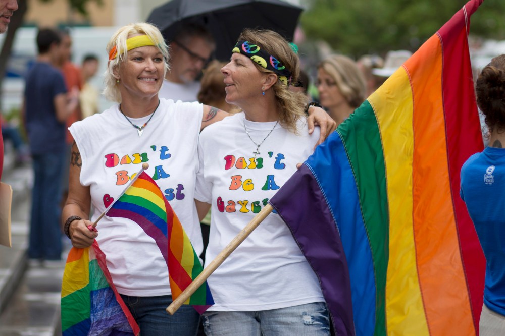 Kimmy Denny and her partner, Barb Lawrence at the court hearing on gay marriage in Miami, Fla. on July 2, 2014. (J Pat Carter/AP)