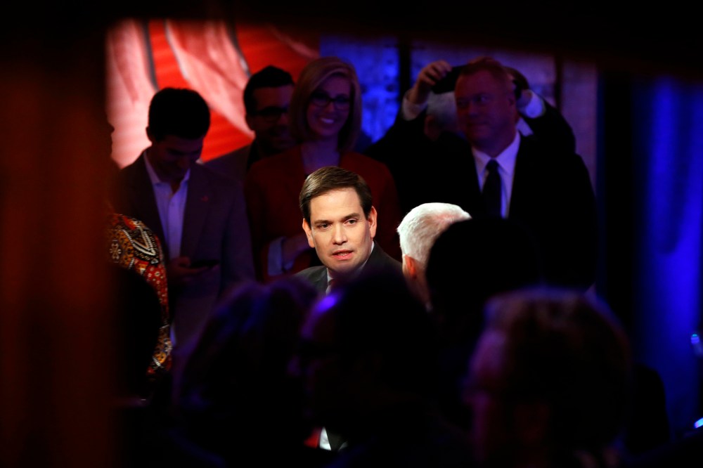 Republican presidential candidate, Sen. Marco Rubio, R-Fla., talks with Anderson Cooper during a commercial break at a CNN town hall event, Feb. 16, 2016, in Greenville, S.C. (Photo by Paul Sancya/AP)