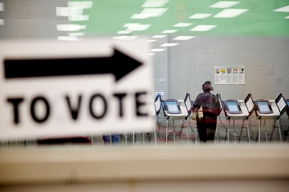 A voter casts her ballot at a polling site in Georgia on May 16, 2014. (David Goldman/AP)
