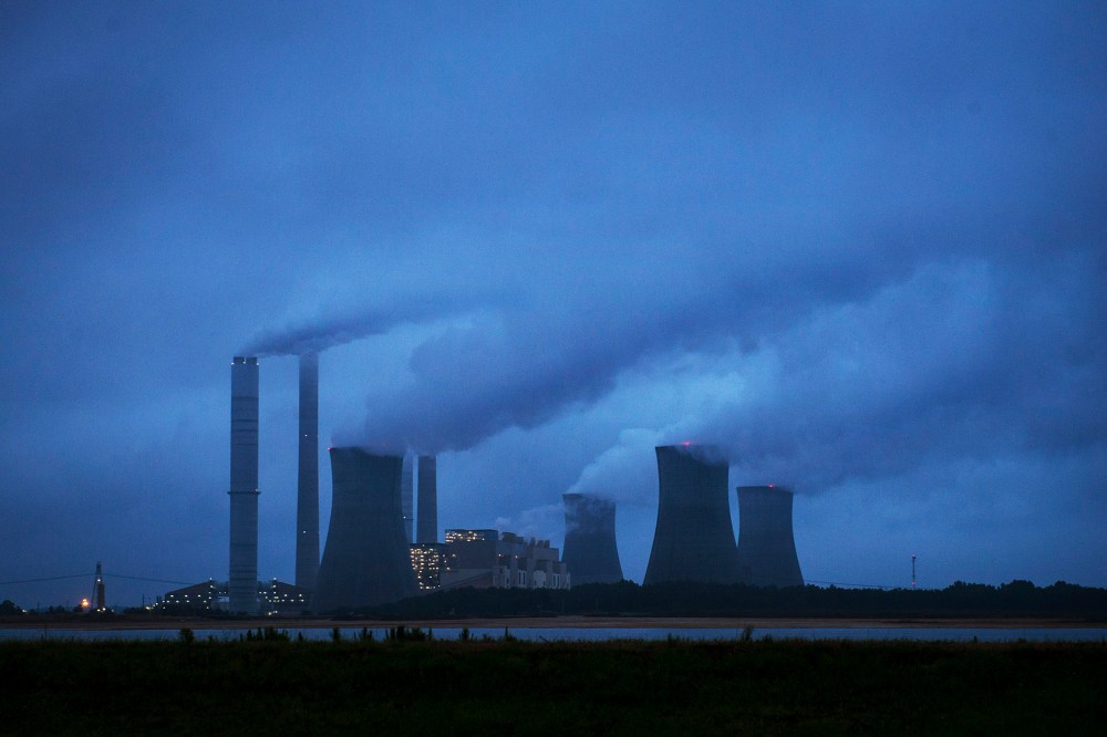 The coal-fired Plant Scherer is shown in operation early Sunday, June 1, 2014, in Juliette, Ga.