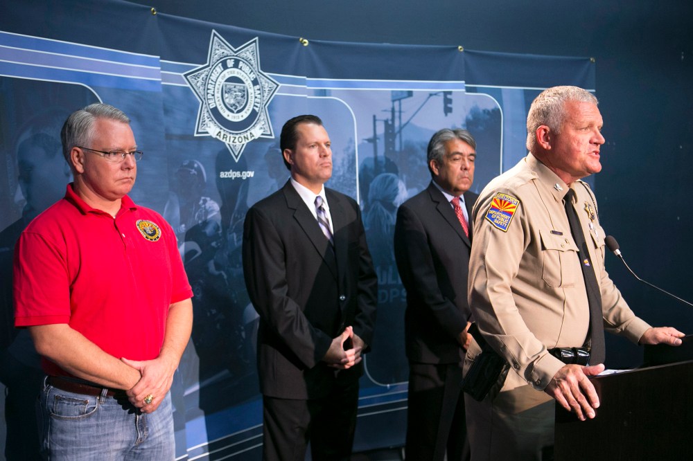 Colonel Frank Milstead, Director of Department of Public Safety holds a press conference to announce the arrest of a suspect in the Phoenix freeway shootings, at DPS headquarters, Sept.18, 2015. (Photo by David Wallace/The Arizona Republic/AP)